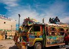 On Top of the World  A few Haitians riding on top of a bus in Port Au Prince, Haiti. : Haiti, Posted