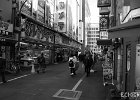 Electric Ave  A busy street in downtown Tokyo, featuring all manner of electronic shops. : BW, Japan