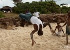 Up in the Air II  A Tanzanian boy does a flip off the rocks on the beach in Dar es Salaam : Dar es Salaam, Tanzania